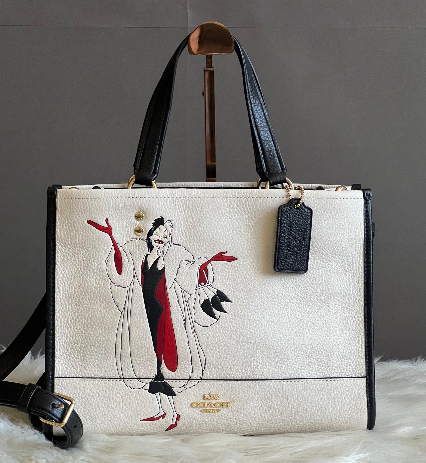 Disney X Coach Dempsey Carryall with Cruella Motif