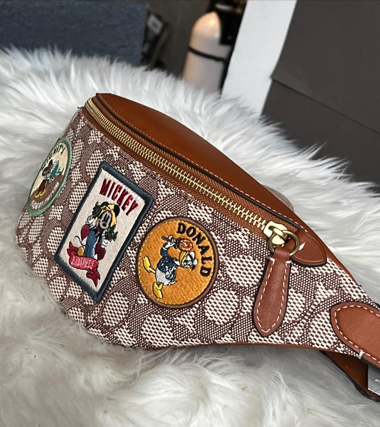 Disney X Coach Charter Belt Bag 7 in Signature Textile Jacquard with Patches