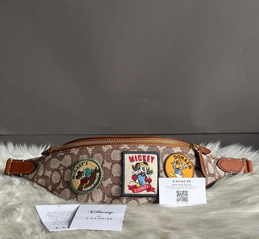 Disney X Coach Charter Belt Bag 7 in Signature Textile Jacquard with Patches