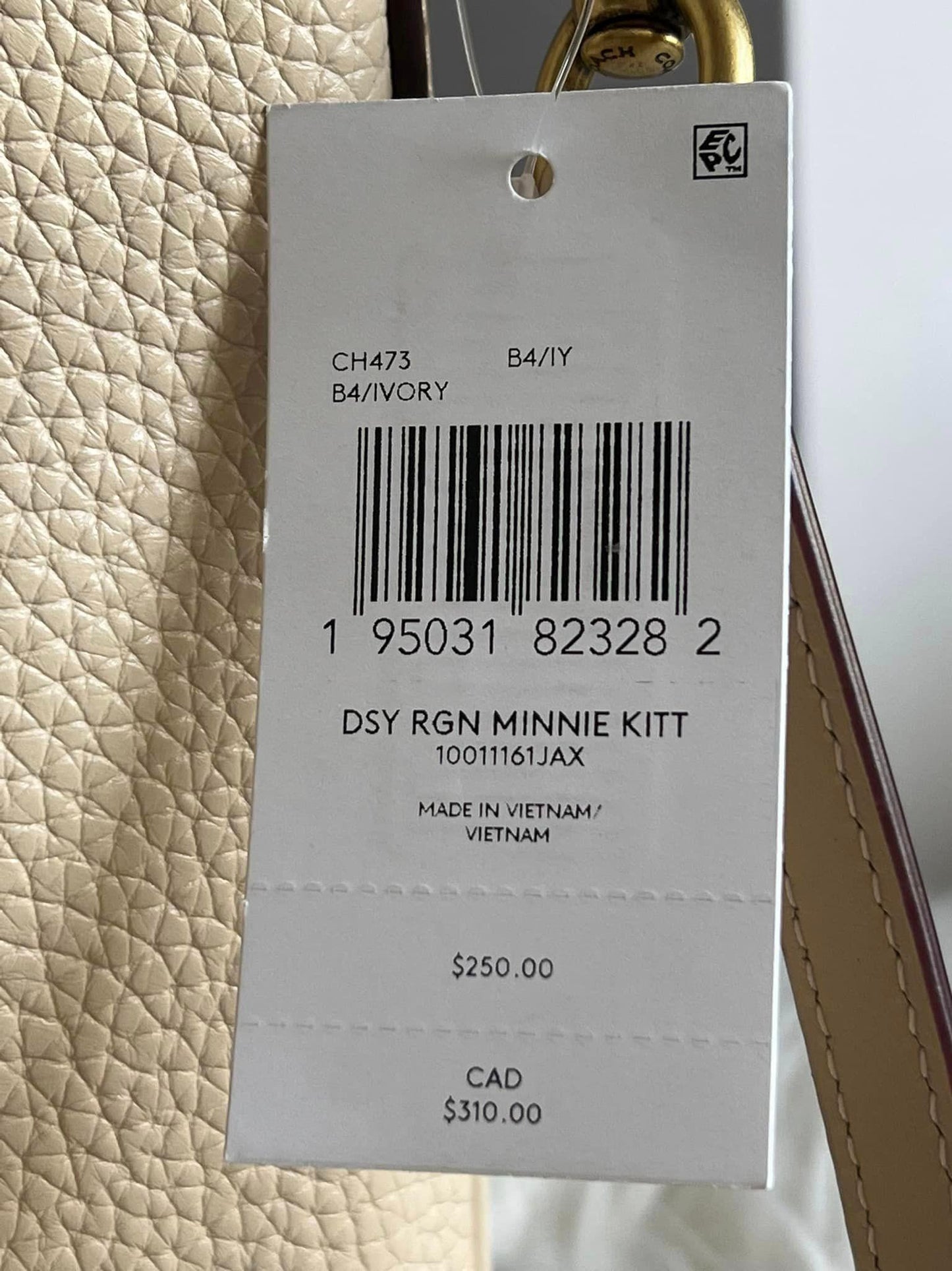 Disney X Coach Kitt Messenger Crossbody in Regenerative Leather with Minnie Mouse