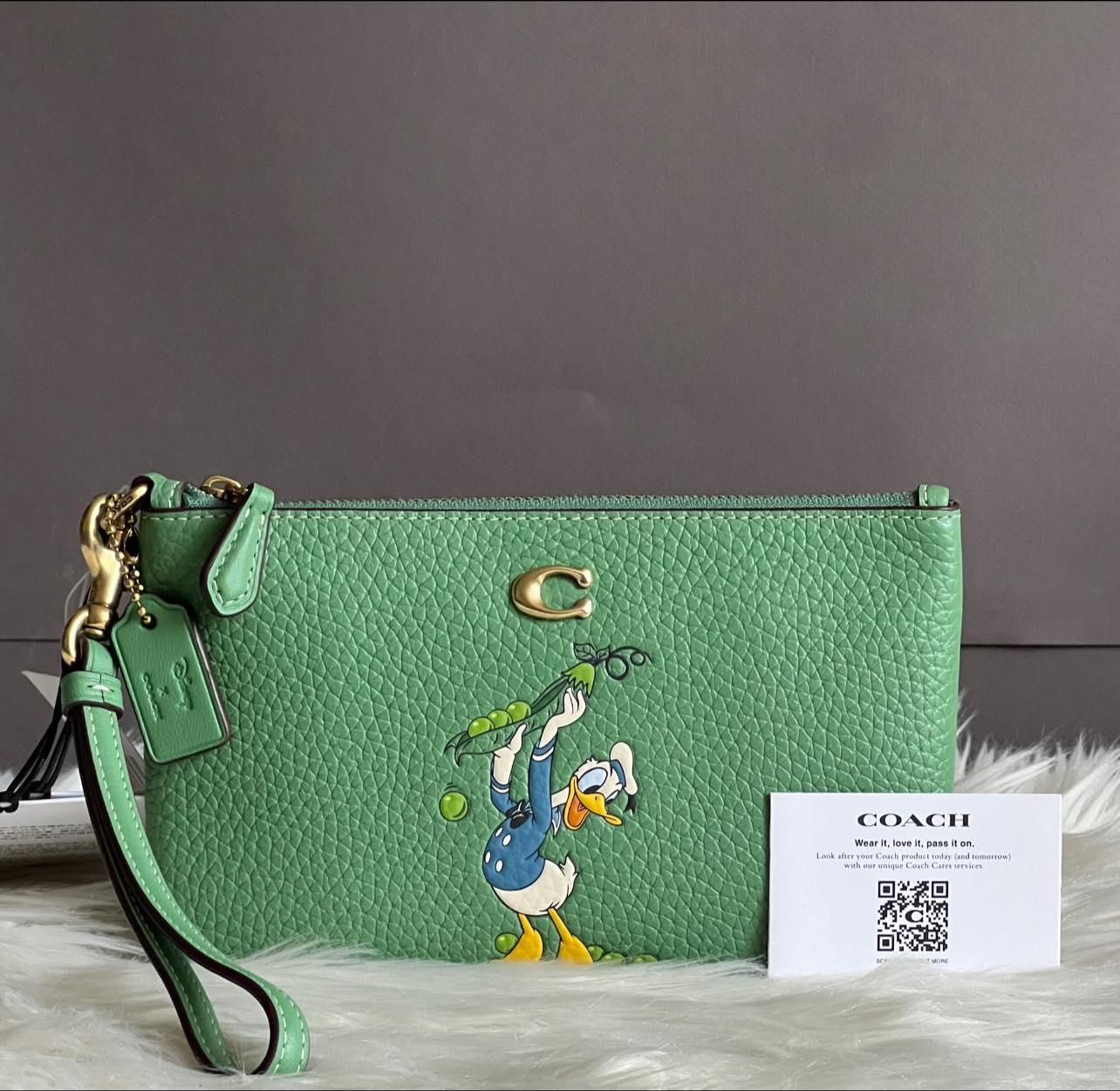Disney X Coach Small Wristlet in Regenerative Leather with Donald Duck