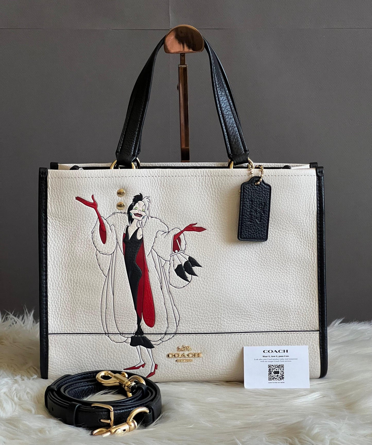 Disney X Coach Dempsey Carryall with Cruella Motif