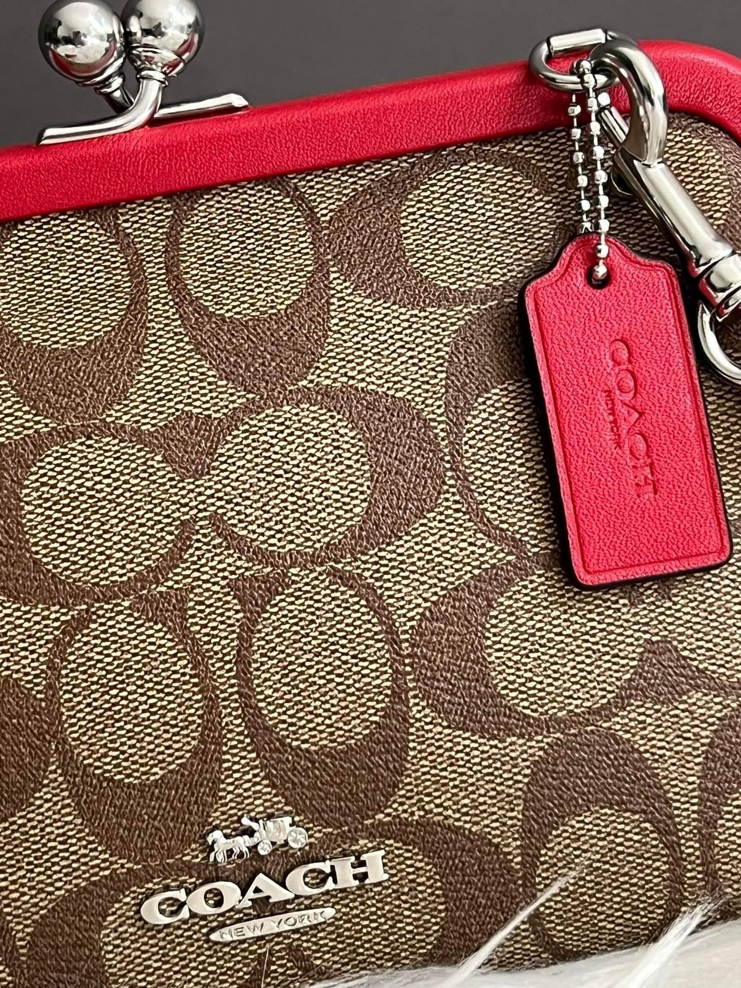 Coach Nora Kisslock Crossbody in Signature Canvas