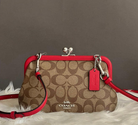 Coach Nora Kisslock Crossbody in Signature Canvas