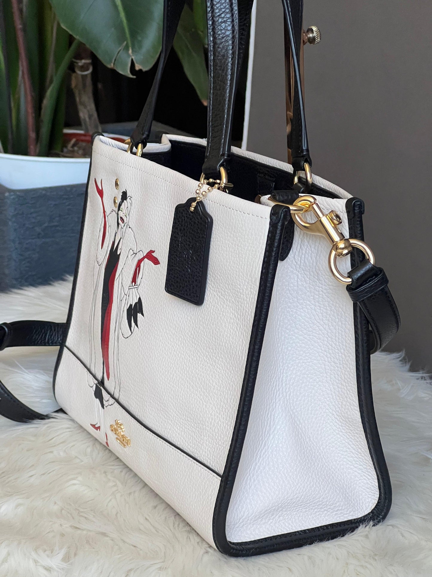 Disney X Coach Dempsey Carryall with Cruella Motif