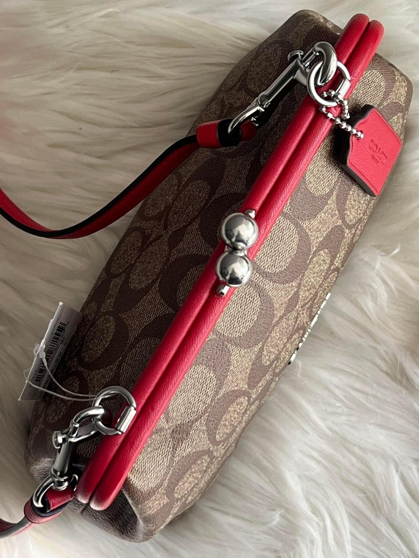 Coach Nora Kisslock Crossbody in Signature Canvas