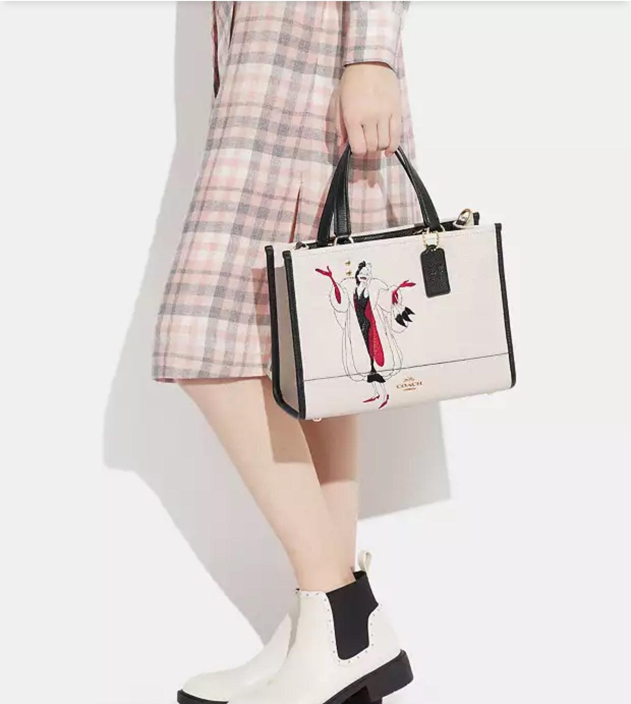 Disney X Coach Dempsey Carryall with Cruella Motif