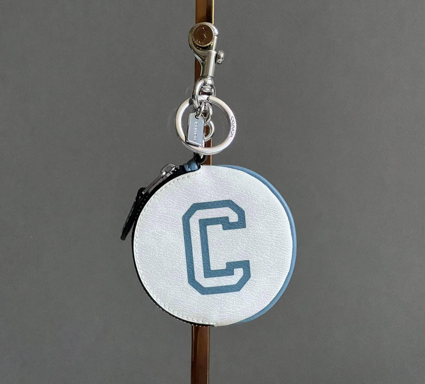 Coach Circular Coin Pouch In Signature Canvas With Varsity Motif