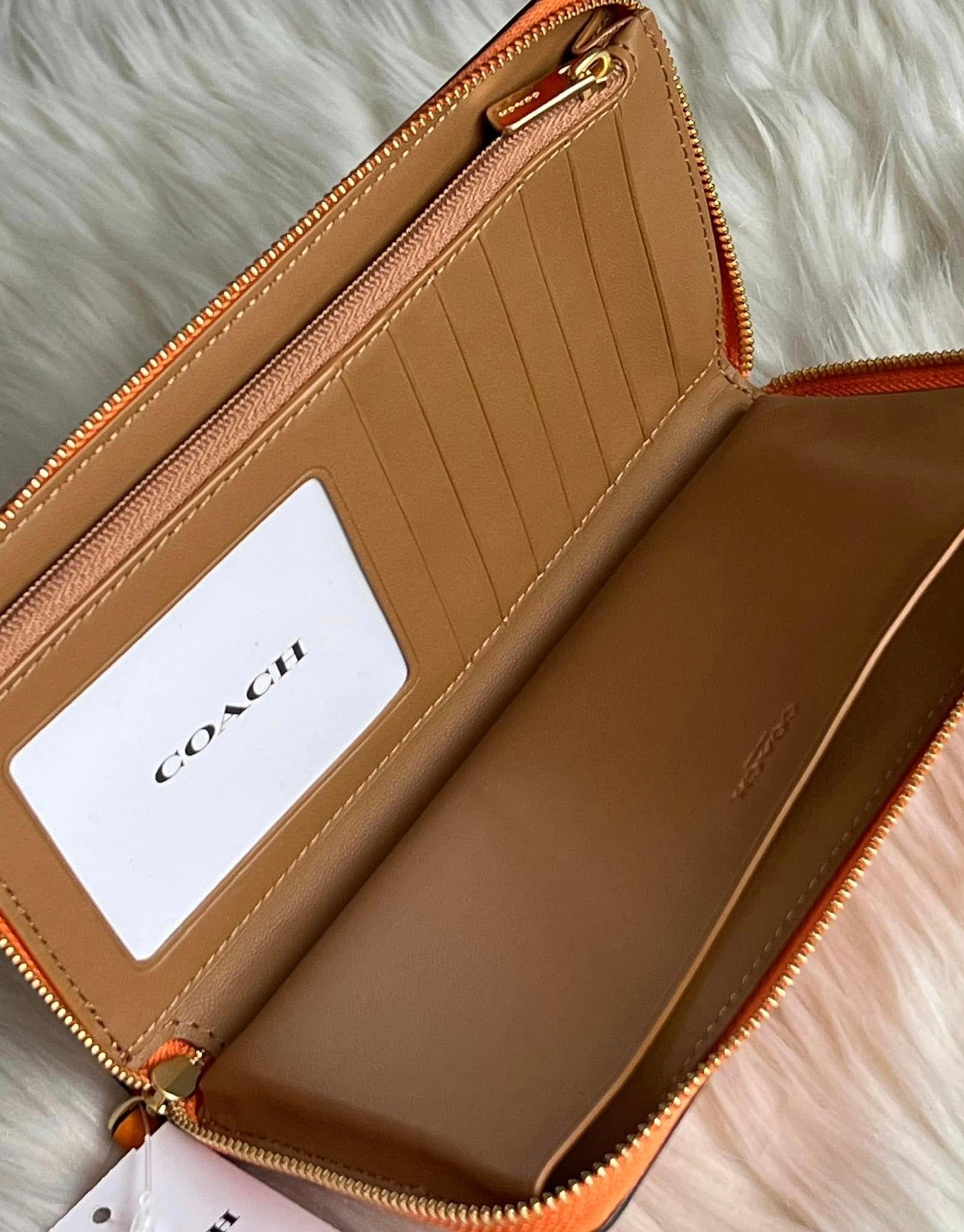 Coach Dempsey Large Phone Wallet