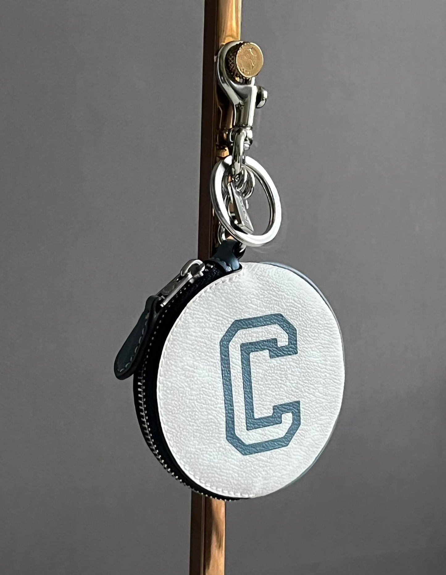 Coach Circular Coin Pouch In Signature Canvas With Varsity Motif
