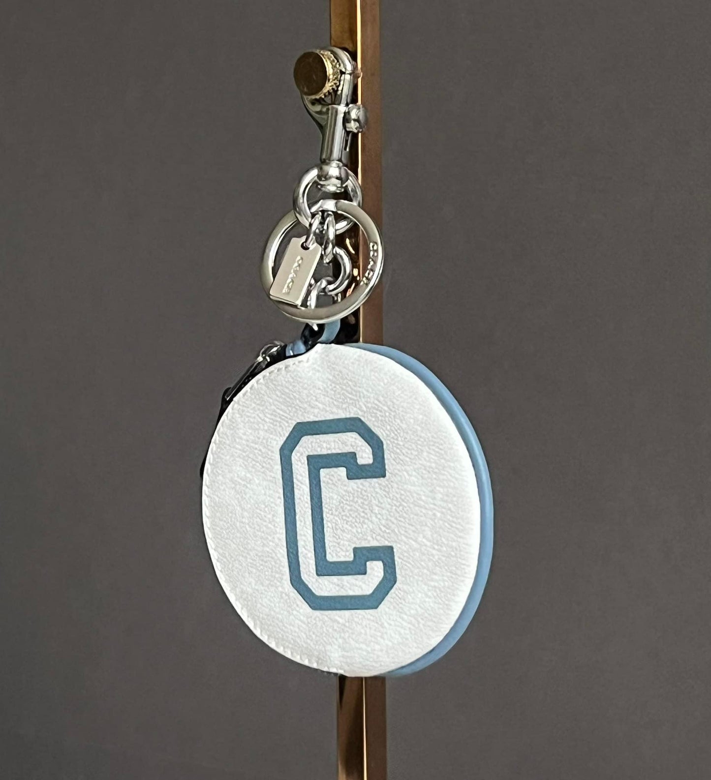 Coach Circular Coin Pouch In Signature Canvas With Varsity Motif