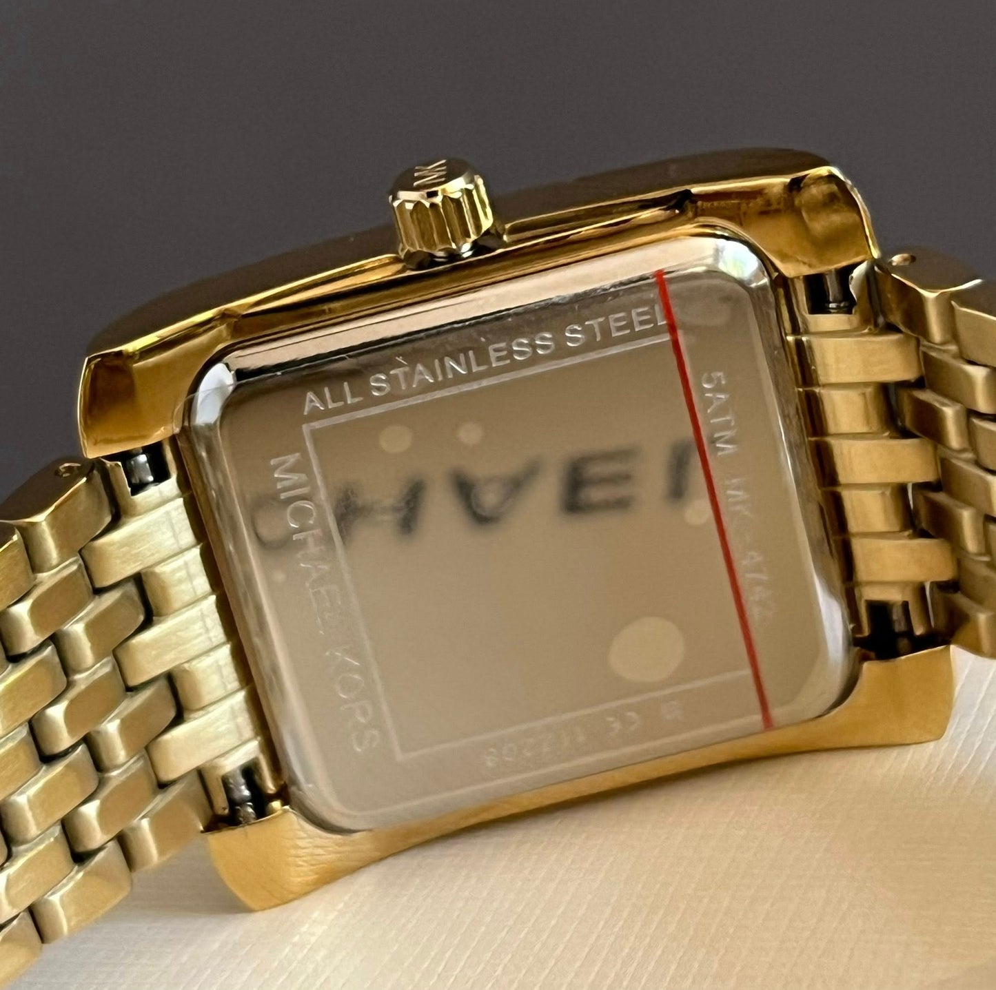 Michael Kors Women’s Emery Three-Hand Gold-Tone Stainless Steel Watch
