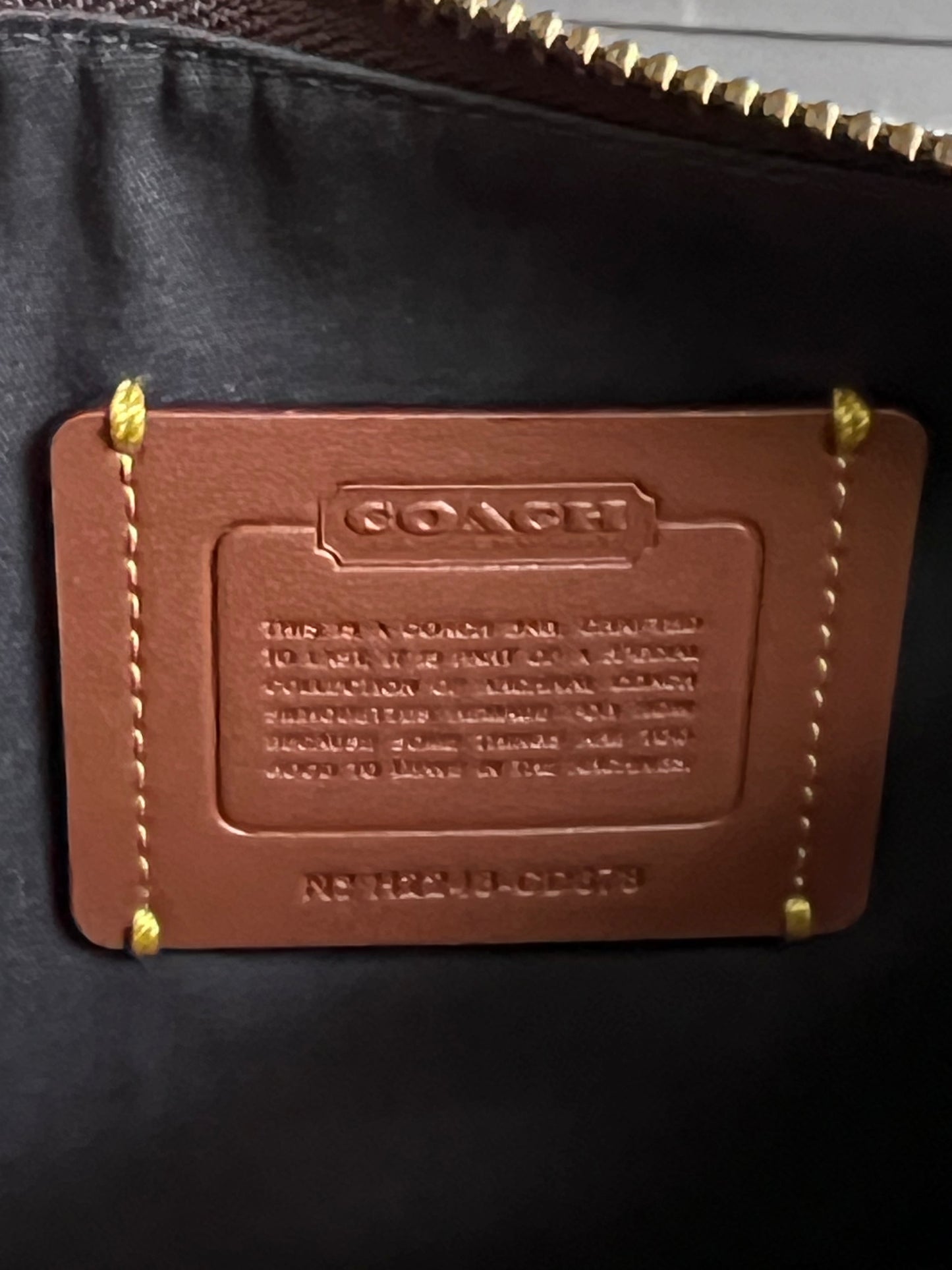 Coach Swinger in Signature Jacquard