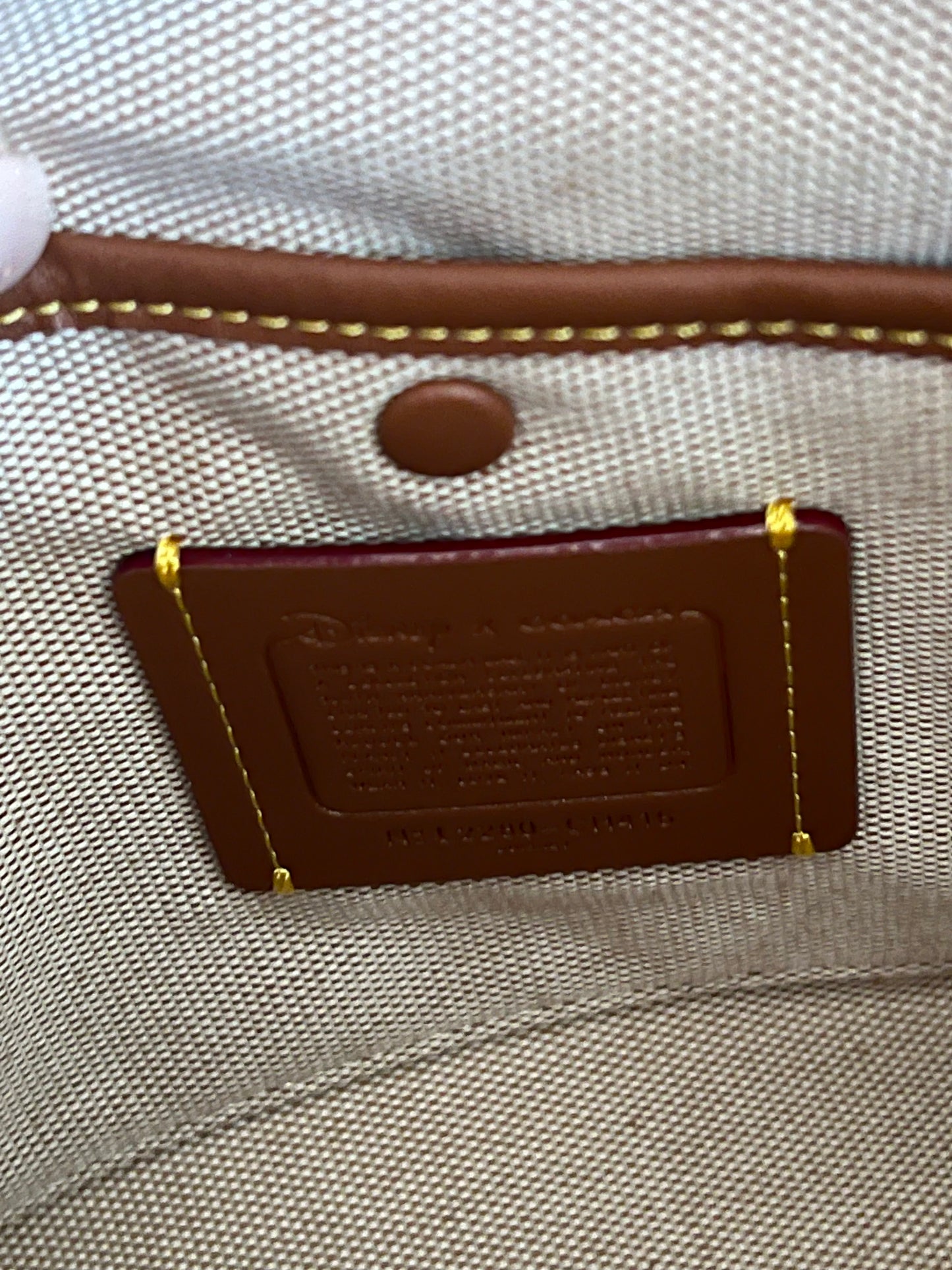 Disney X Coach Rogue 25 in Signature Textile Jacquard with Patches