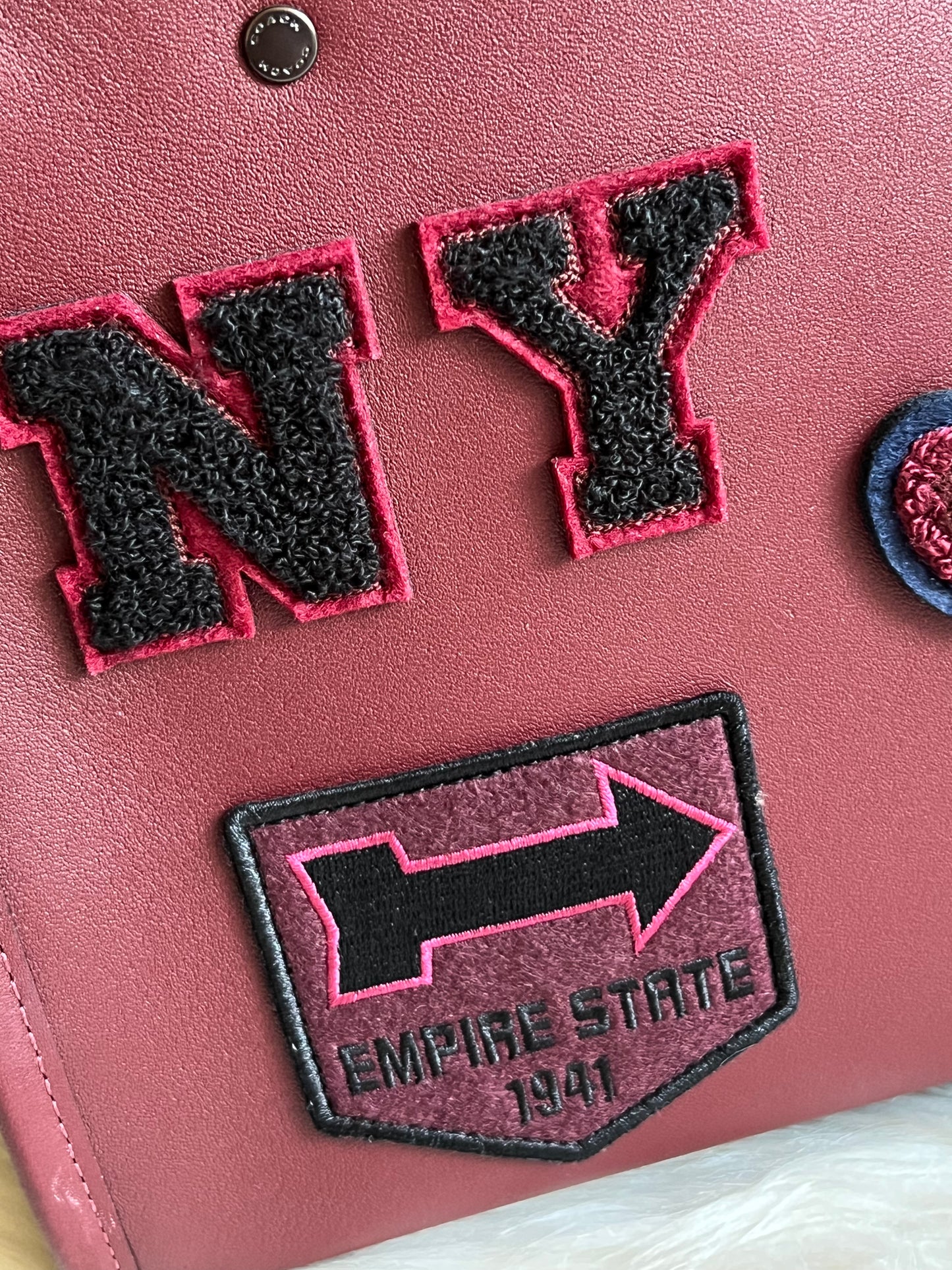 Coach Rogue 25 with Varsity Patches