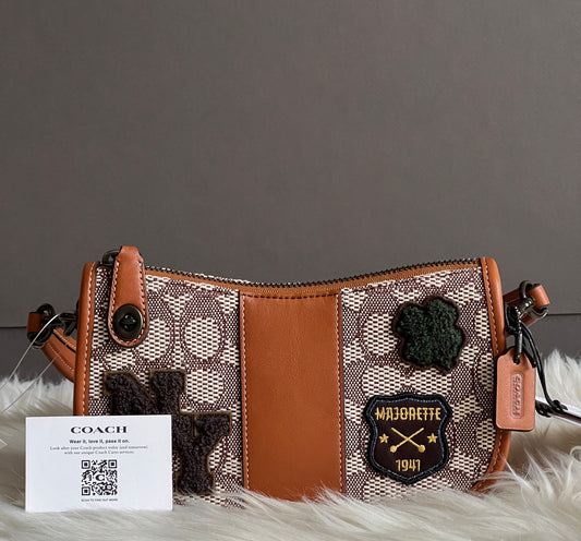 Coach Swinger 20 in Signature Jacquard with Varsity Patches