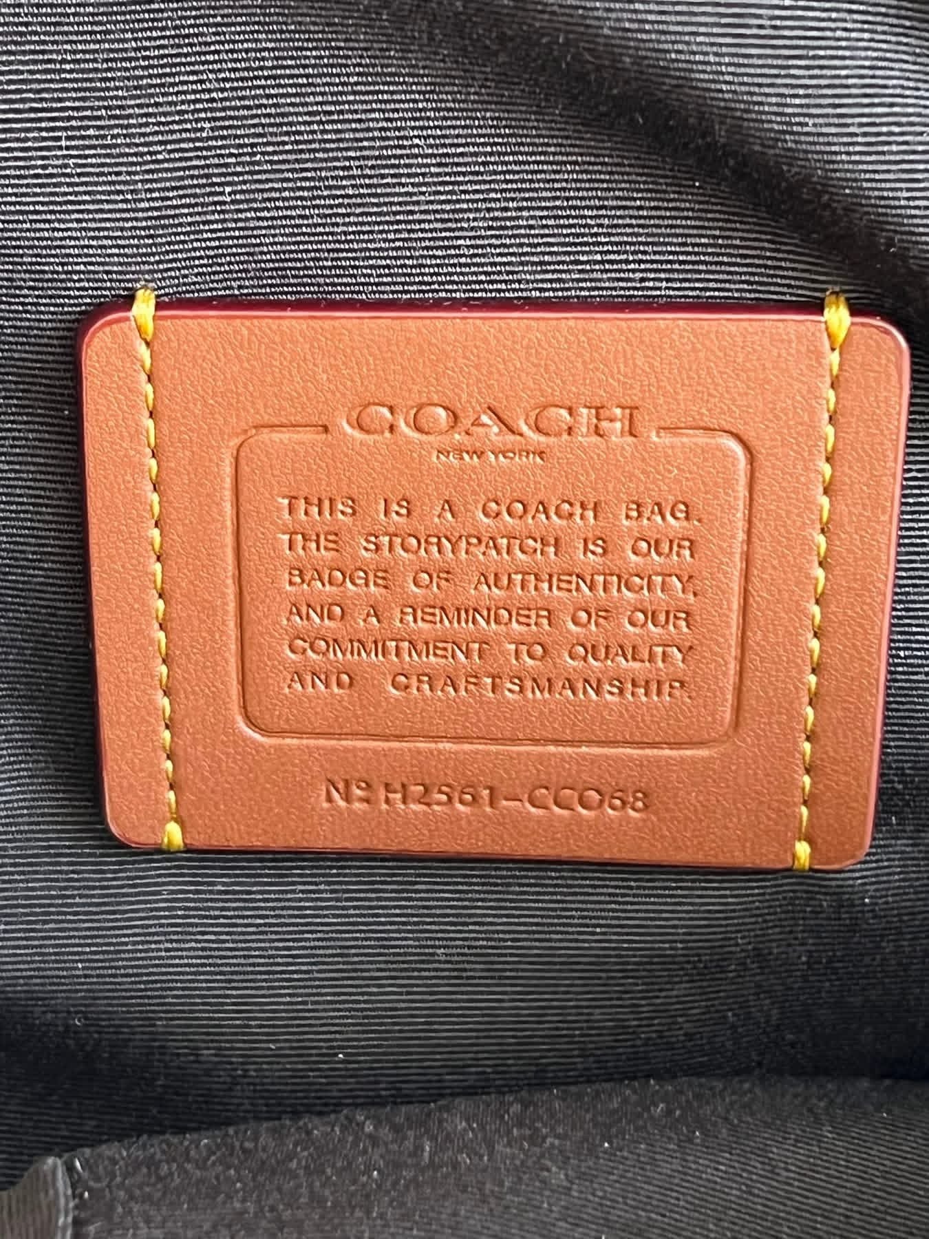 Coach Small Turner Pack In Signature Canvas