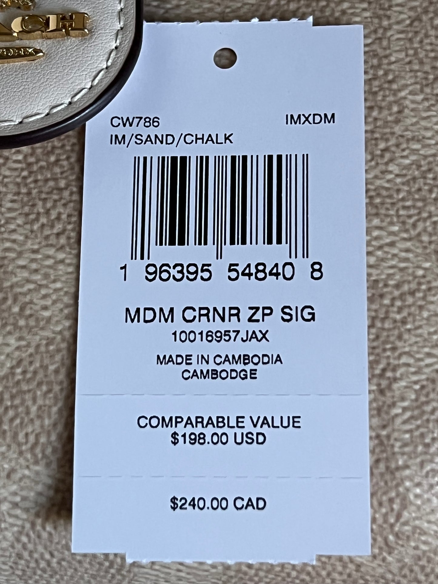 Coach Phone Wallet In Signature Canvas