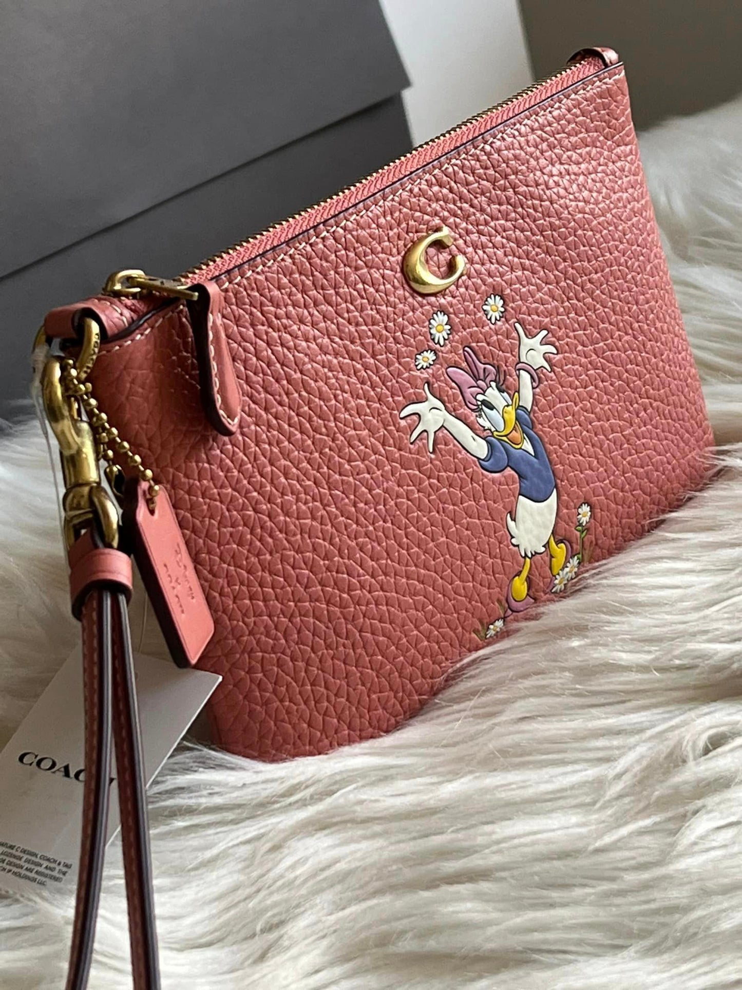 Disney X Coach Small Wristlet in Regenerative Leather with Daisy Duck