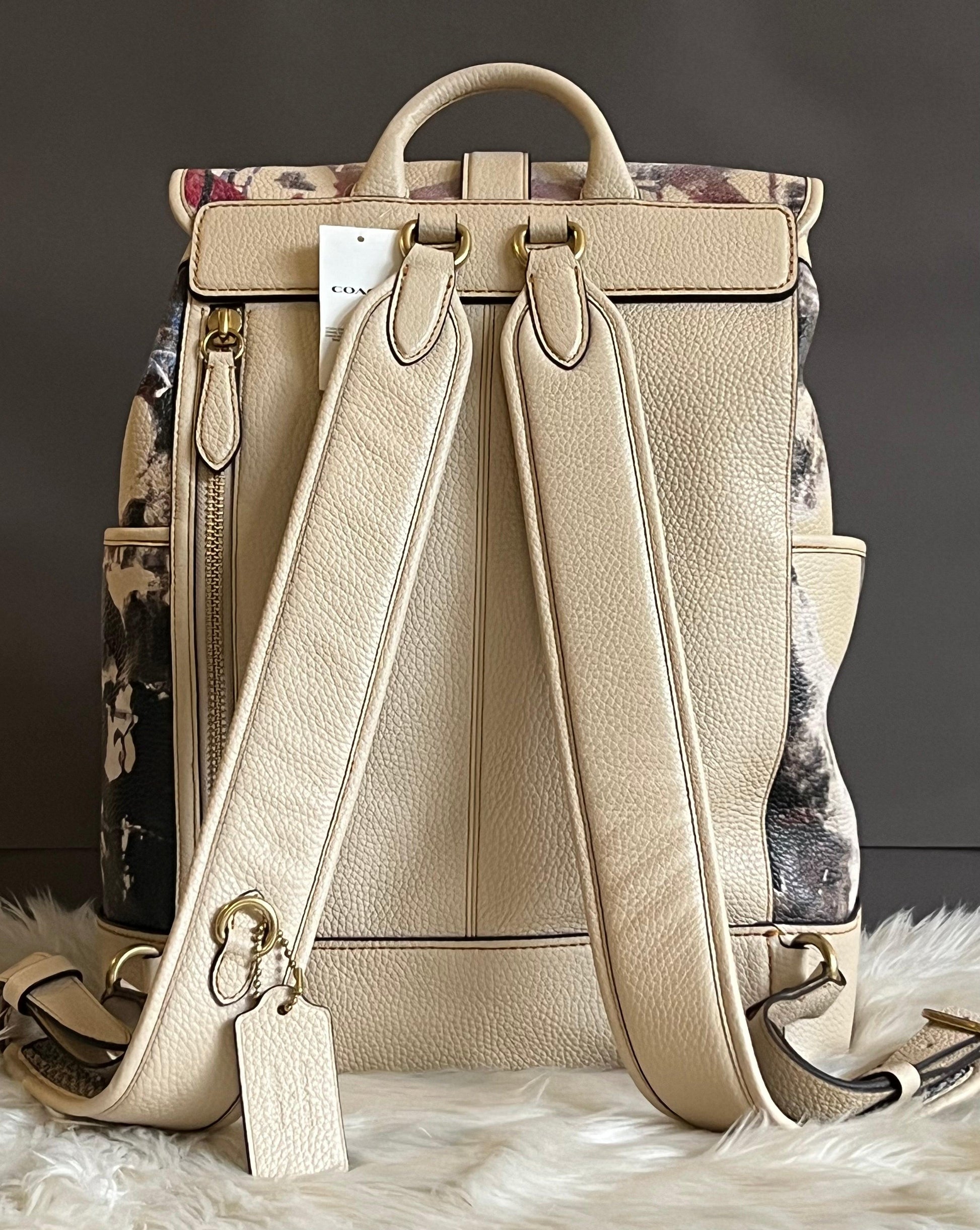 coach carriage backpack Jes With Rainbow Horse and Signature coated canvas printed coated canvas and refined pebble leather Inside zip and multifunction pockets Double zip closure fabric lining Handle with 2 1/4 drop Outside zip pocket Adjustable shoulder straps 10 3/4 (L) x 12 1/2 (H) x 4 3/4 (W) Style No. Restored Hitch Backpack With Horse