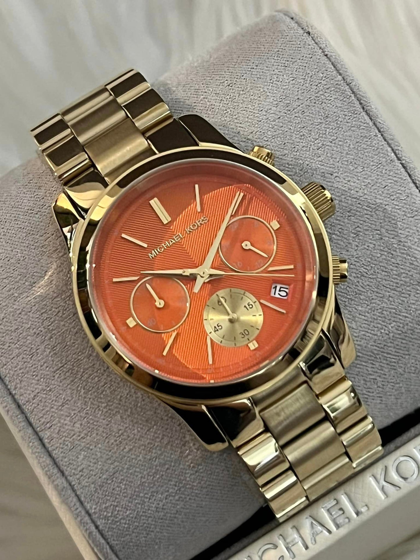 Michael Kors Women’s Runway Chronograph Gold-Tone Watch with Orange Dial