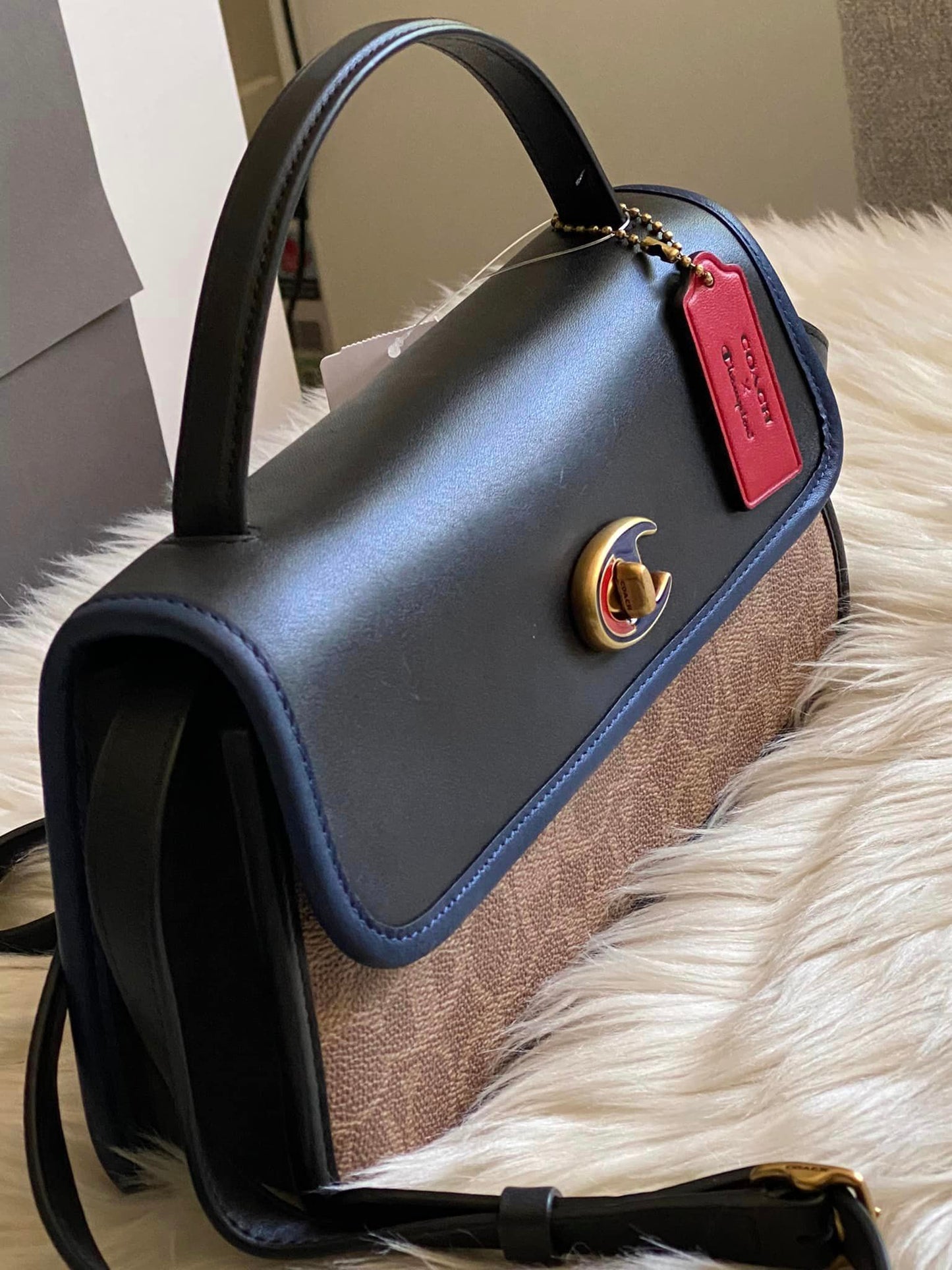 Coach X Champion Turnlock Clutch in Signature Canvas