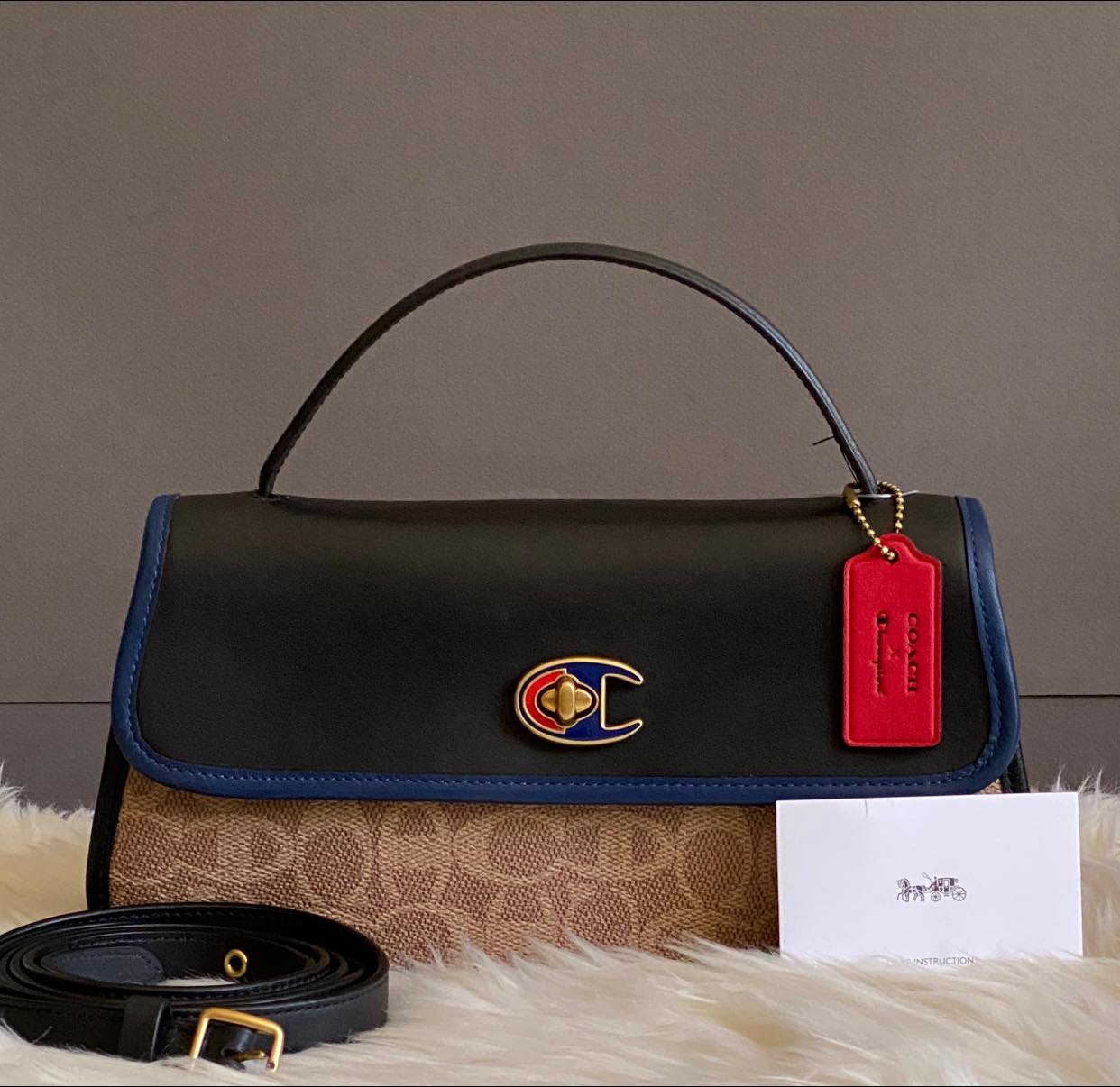 Coach X Champion Turnlock Clutch in Signature Canvas