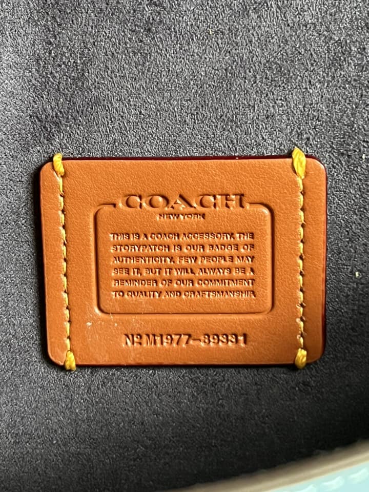 Coach Courier Wristlet