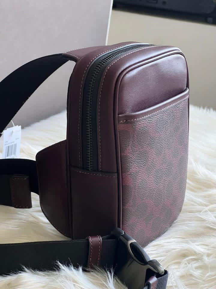 Coach Small Turner Pack In Signature Canvas