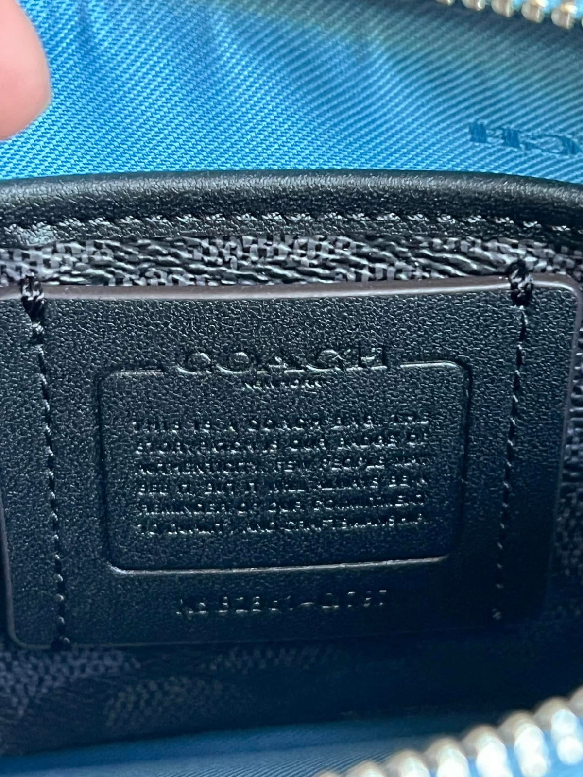 Coach Pouch Bag with Signature Canvas Detail