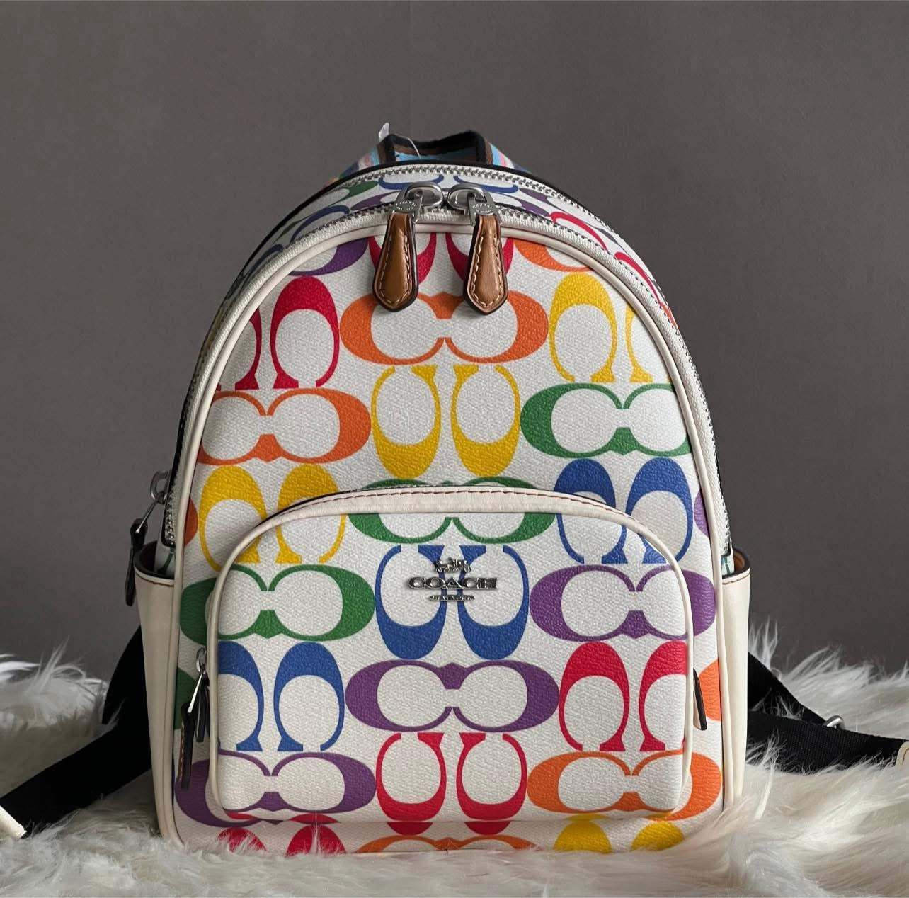 backpack women coach Jordyn Backpack, Khaki Multi : Clothing, Shoes & Jewelry Refined pebble leather Inside zip cell phone and multifunction pockets Laptop compartment with zip closure Zip closure recycled polyester lining Top handle with 2 drop Outside zip pockets Adjustable shoulder straps Fits a 12 (zip compartment) or 13 (main compartment) laptop 10 3/4 (L) x 14 (H) x 5 1/4 (W) Style No. Coach Elle Backpack Tan Leather