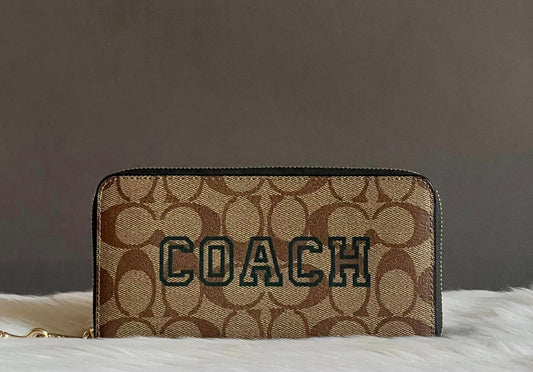 Coach Long Zip Around Wallet In Signature Canvas With Varsity Motif