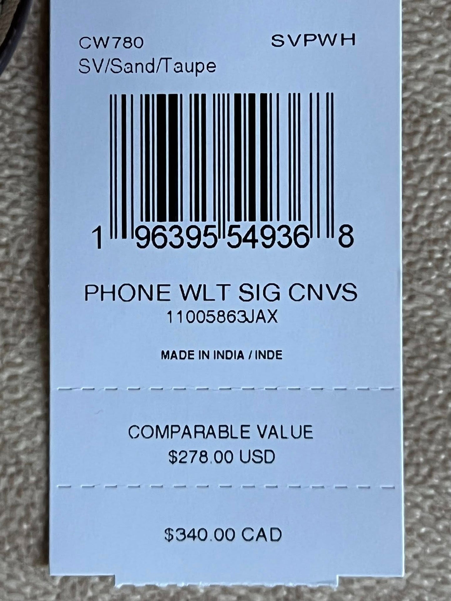 Coach Phone Wallet In Signature Canvas