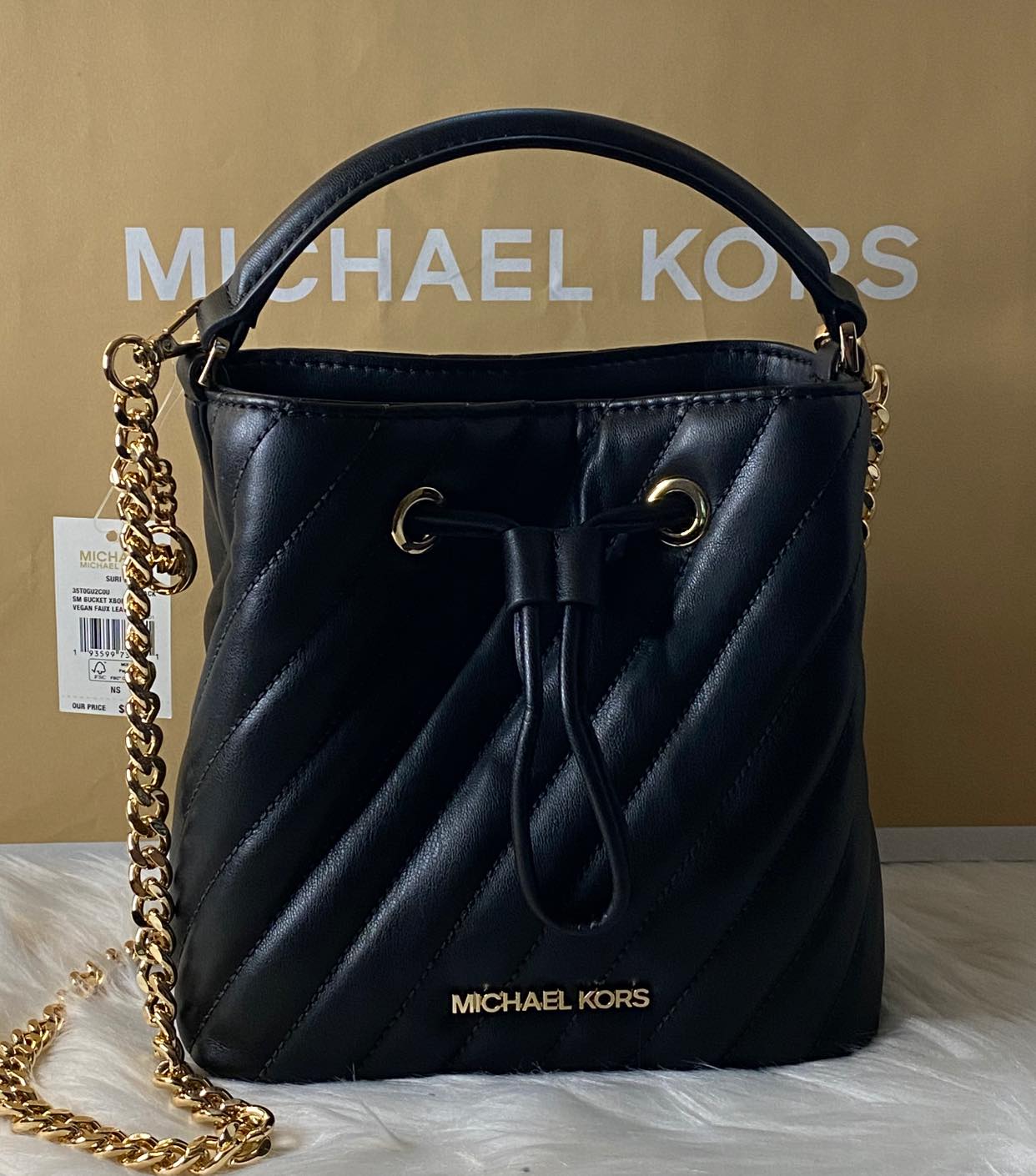 Michael Kors Suri Medium Bucket Crossbody Quilted Vegan Faux Leather Bag  (Black): Handbags