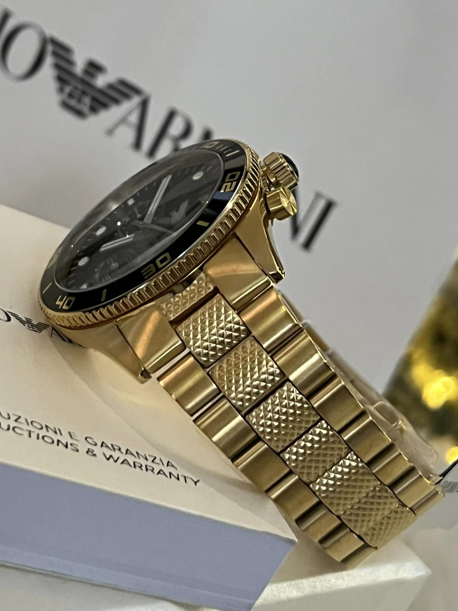 Black gold armani clearance watch