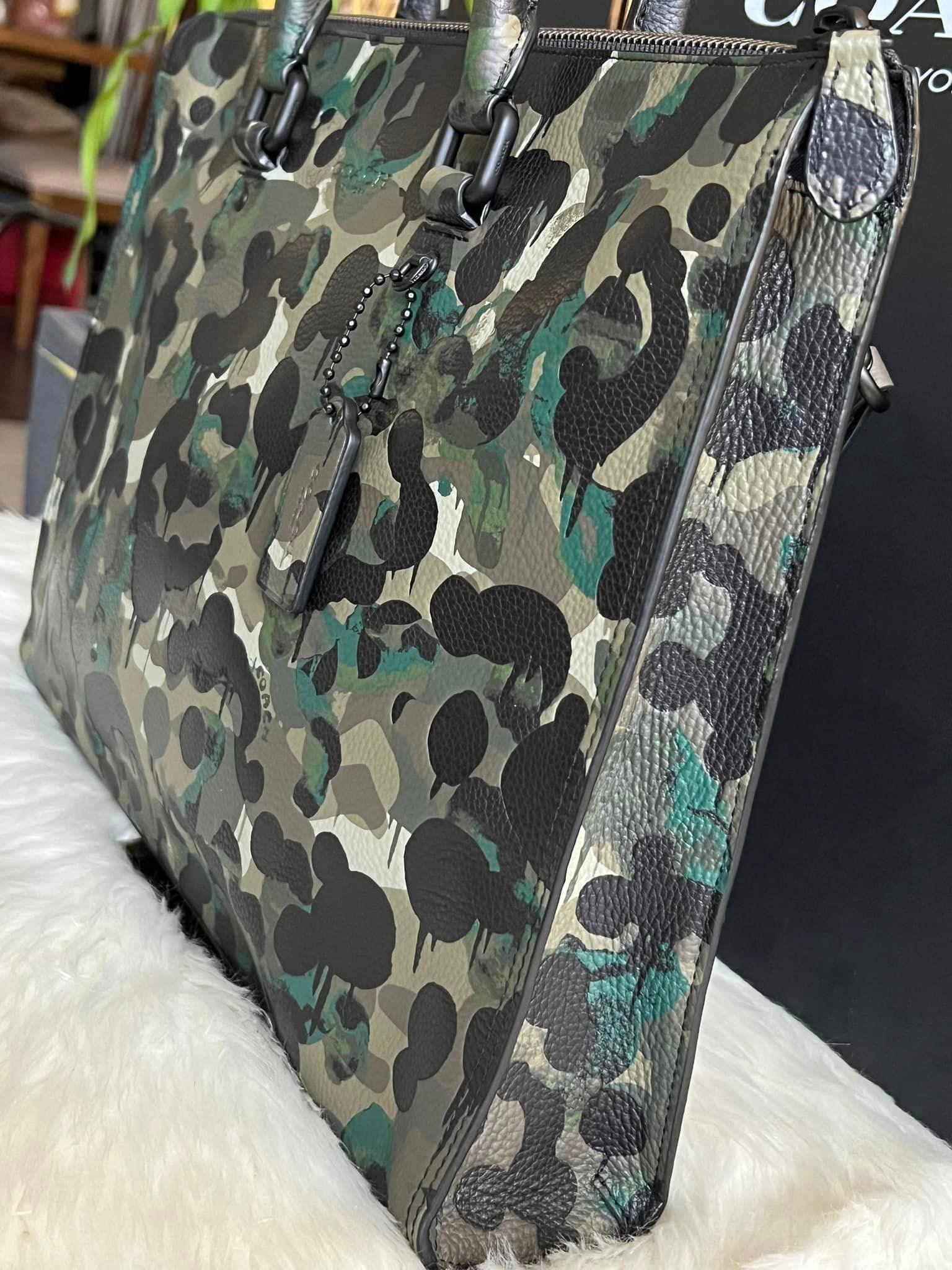 Coach hot sale camo luggage