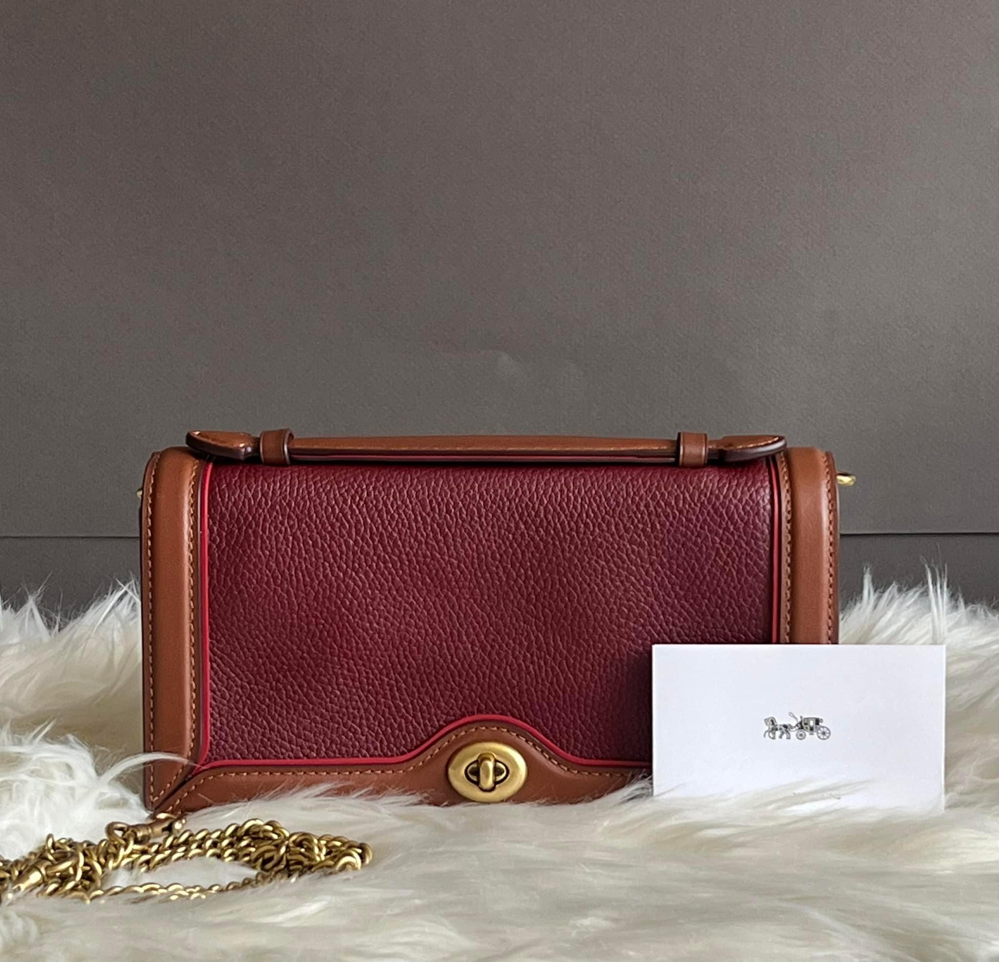 Coach best sale riley clutch