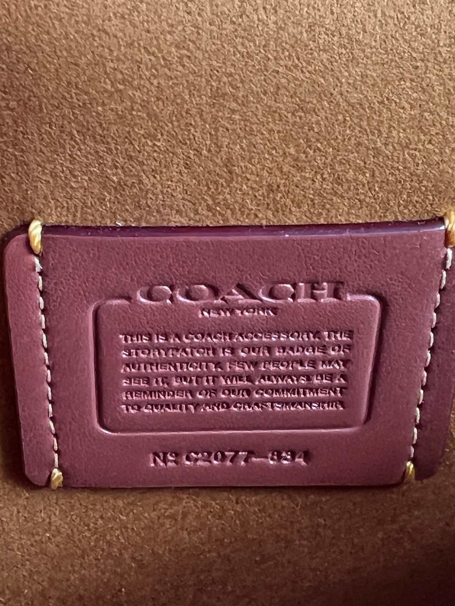 Coach Courier Wristlet with Floral Appliqué