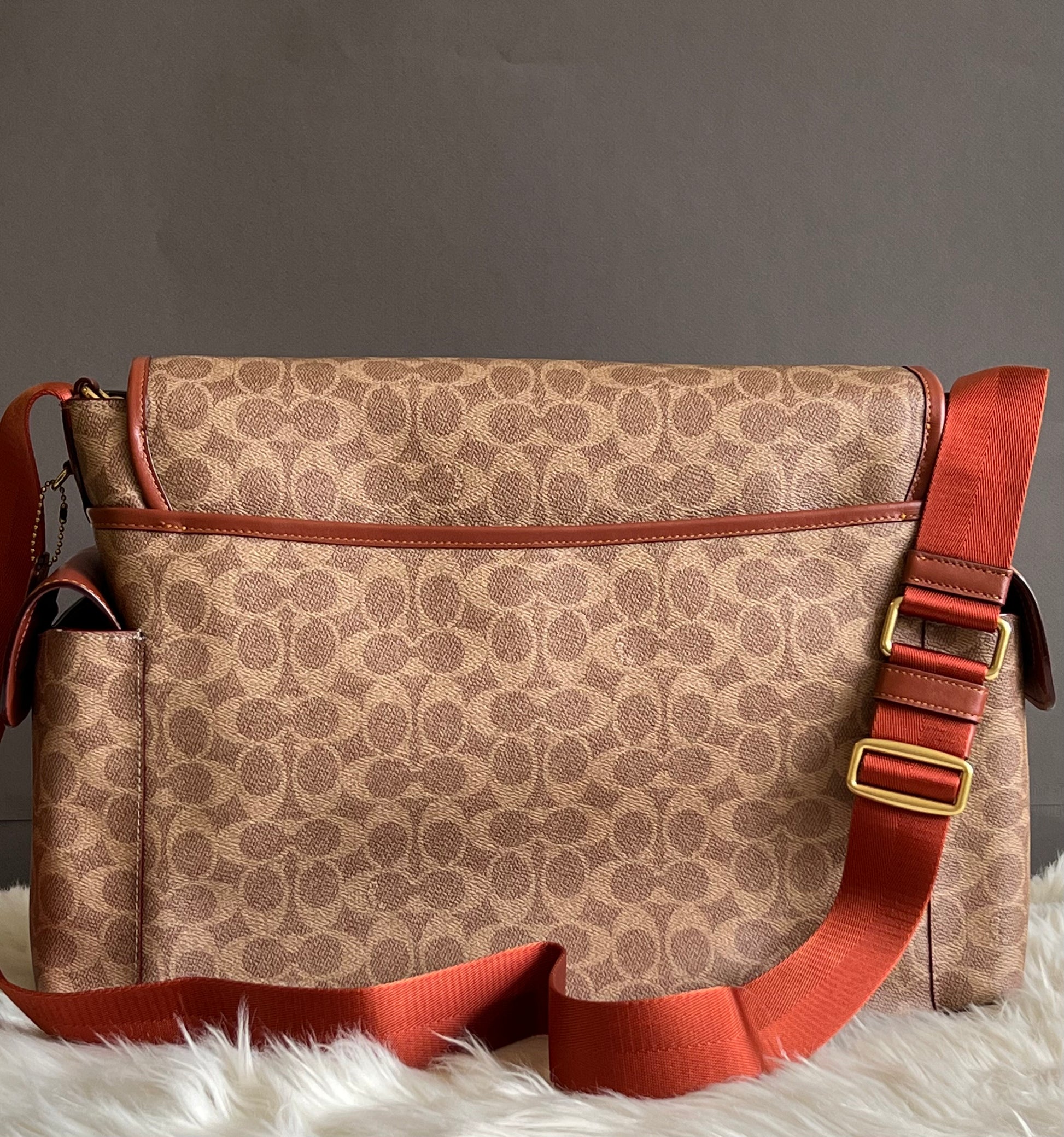 COACH®: Baby Messenger Bag In Signature Canvas